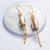 Picture of Wholesale Gold Plated Big Dangle Earrings with No-Risk Return