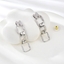 Show details for Trendy White Luxury Dangle Earrings with No-Risk Refund