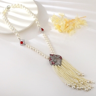 Show details for Classic Red Y Necklace with Speedy Delivery Show details for Classic Red Y Necklace with Speedy Delivery